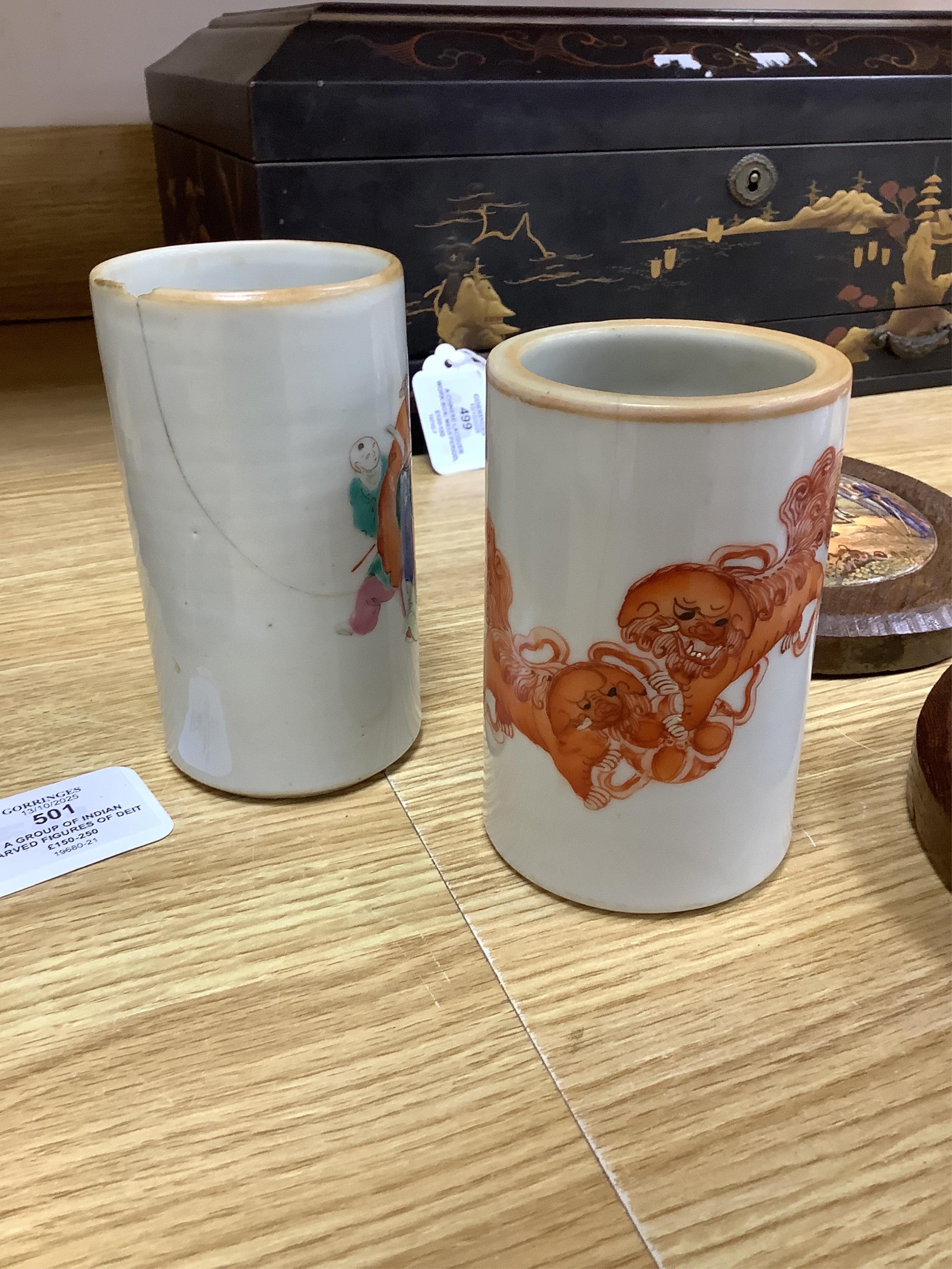 A collection of Chinese ceramics to include a blue and white mug, set of three graduated Canton jars and covers and two cylindrical brush washers